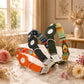 Colorful dog collars with floral patterns on a marble surface with flowers and a window in the background