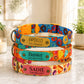 Colorful dog collars with personalized nameplates on a marble surface.