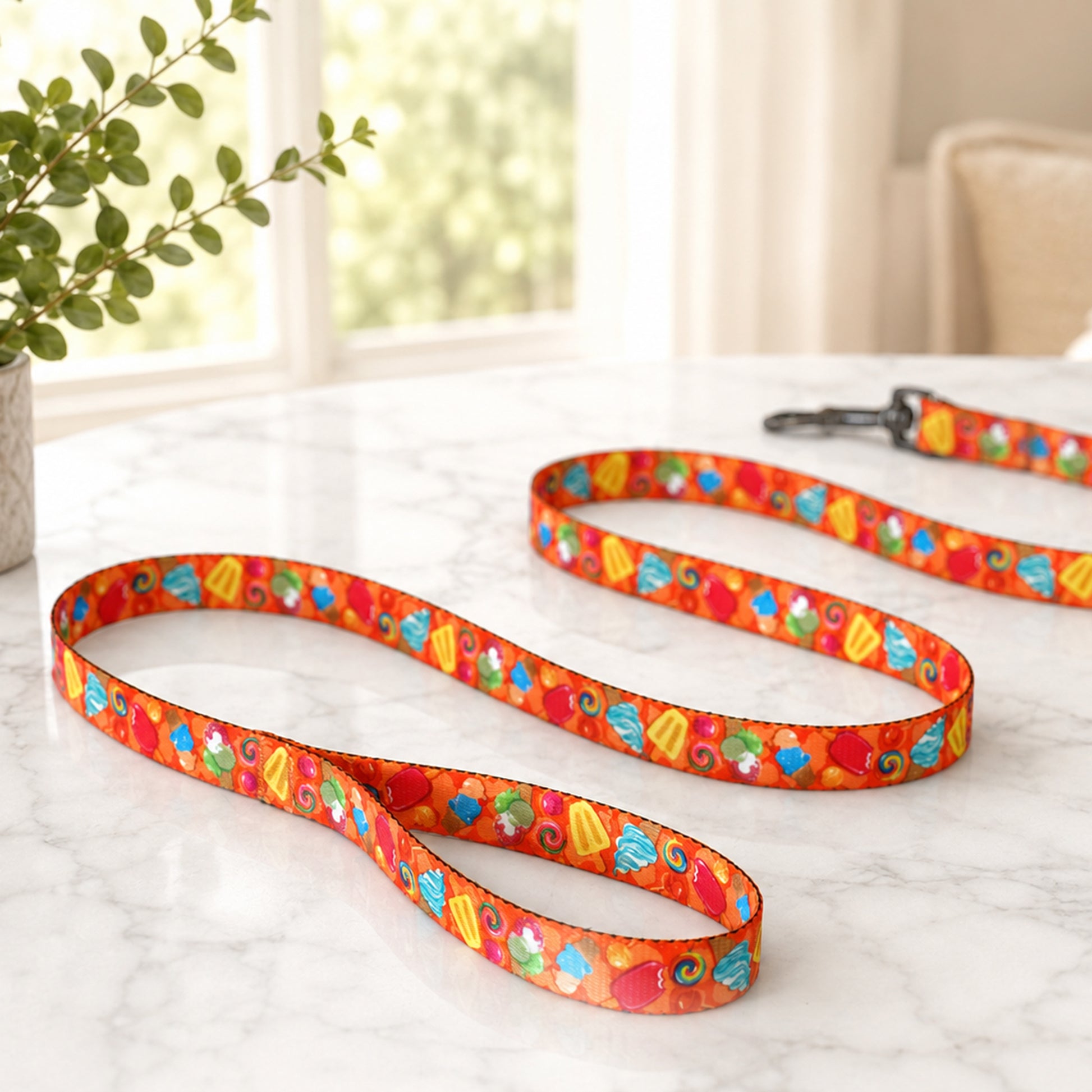 Colorful dog leash with a pattern on a white surface.