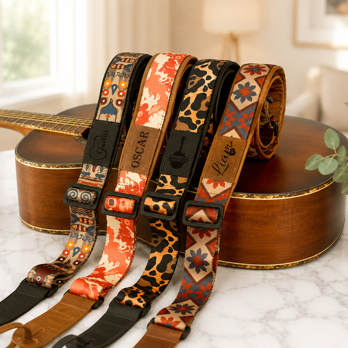 Set of colorful guitar straps with brand names on a guitar