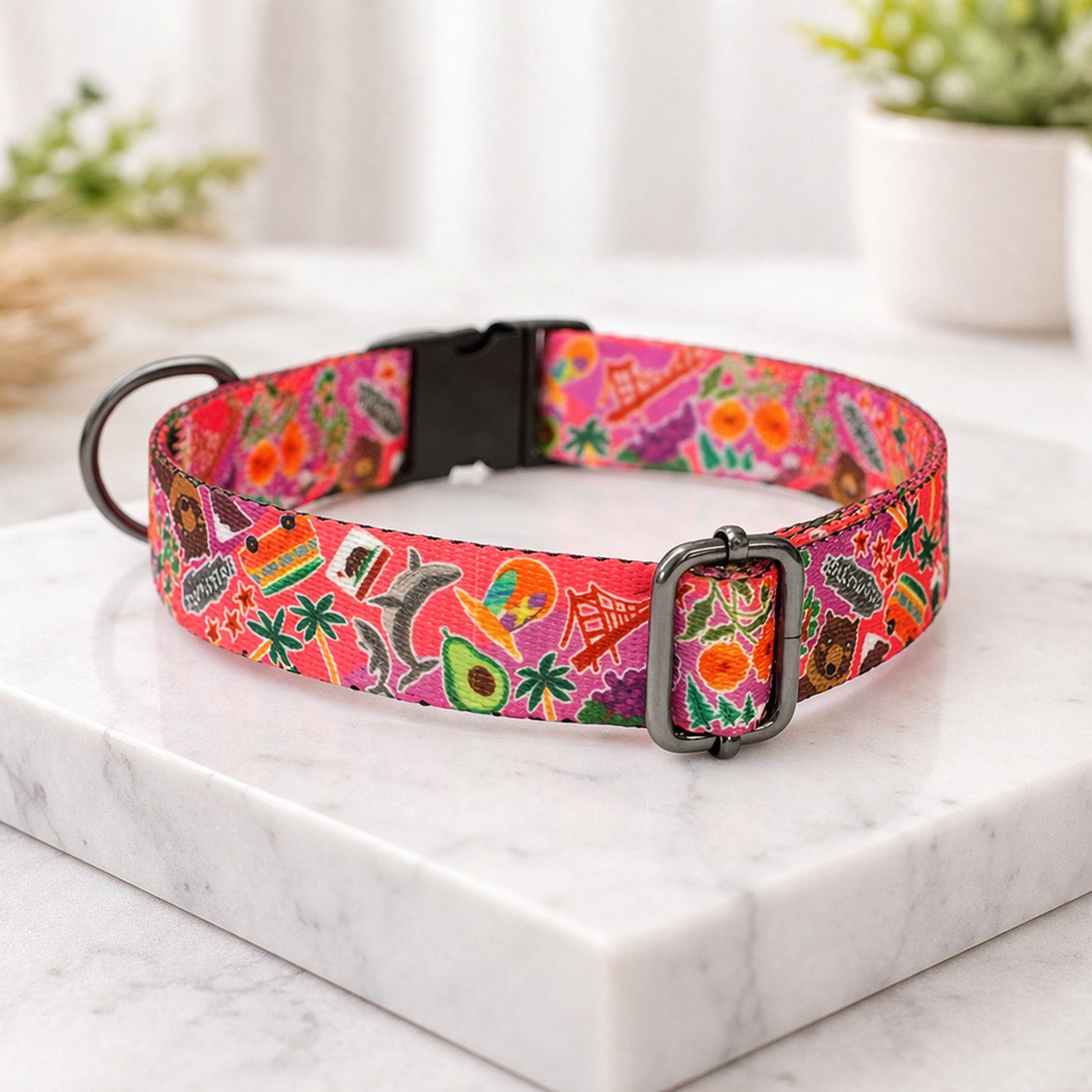 Colorful dog collar with a pattern on a marble surface