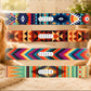 Four colorful patterned headbands with 'STYLE' labels on a blurred natural background