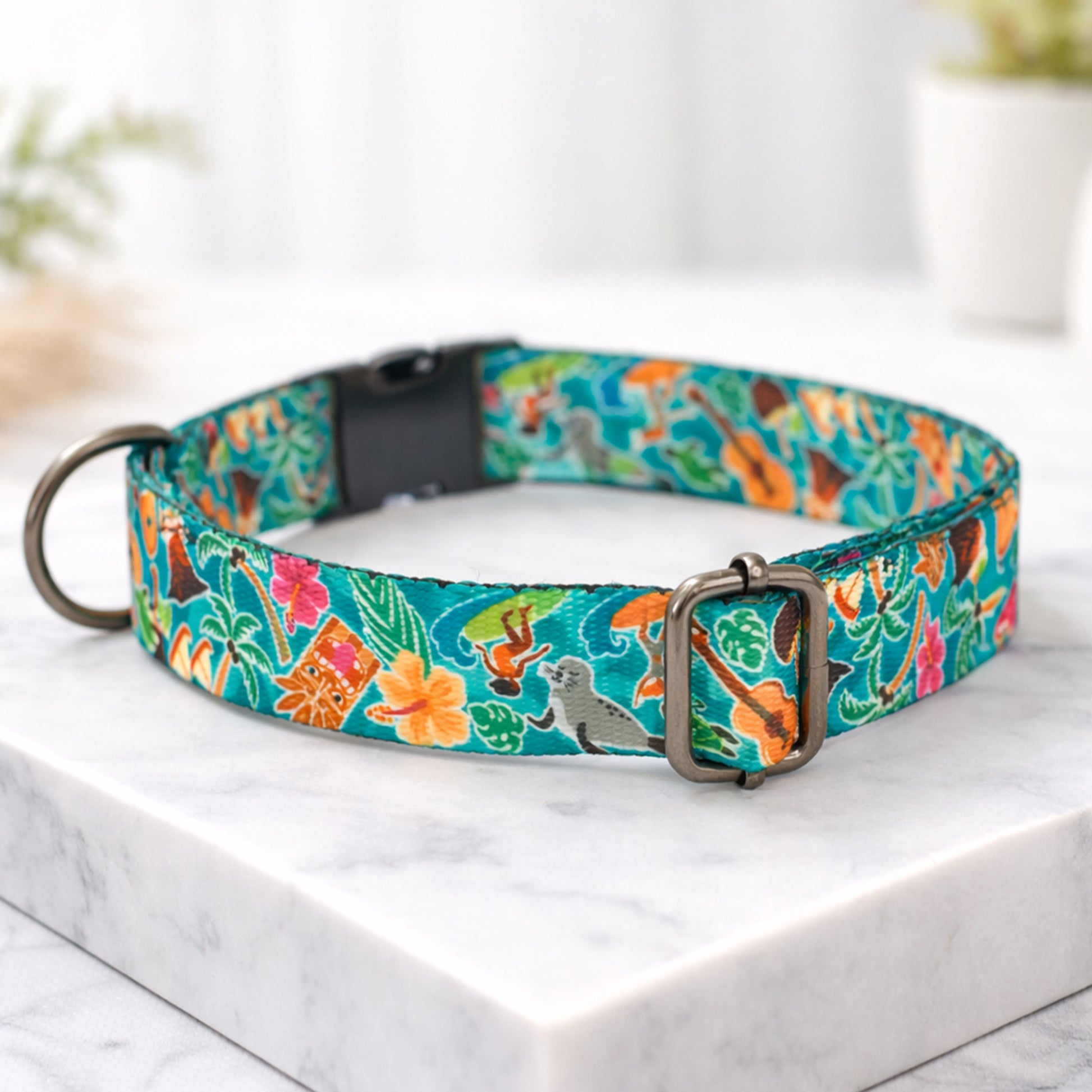 Colorful dog collar with a pattern on a marble surface