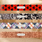 Four different patterned ribbons with labels on a wooden surface