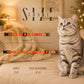Cat collar size chart with a cat sitting next to it on a couch.