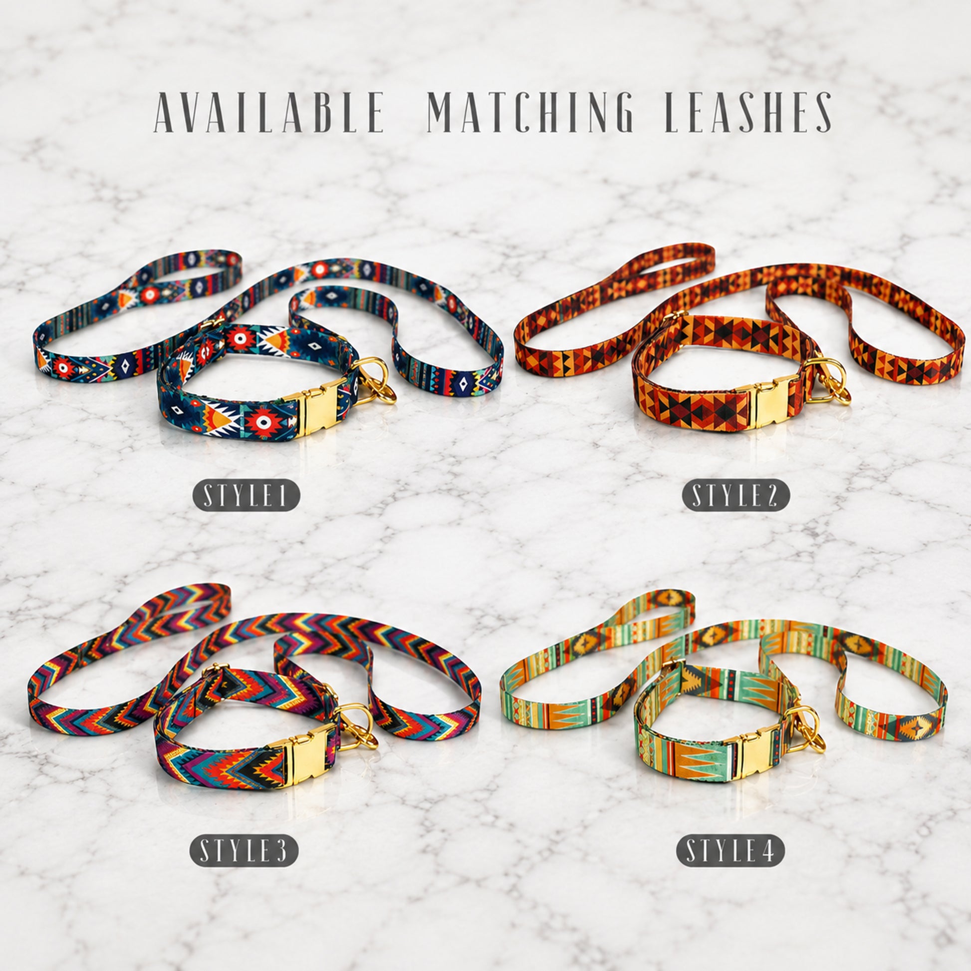 Four colorful dog leashes with gold clasps on a marble surface