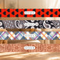 Four colorful hairbands with different patterns on a wooden surface.
