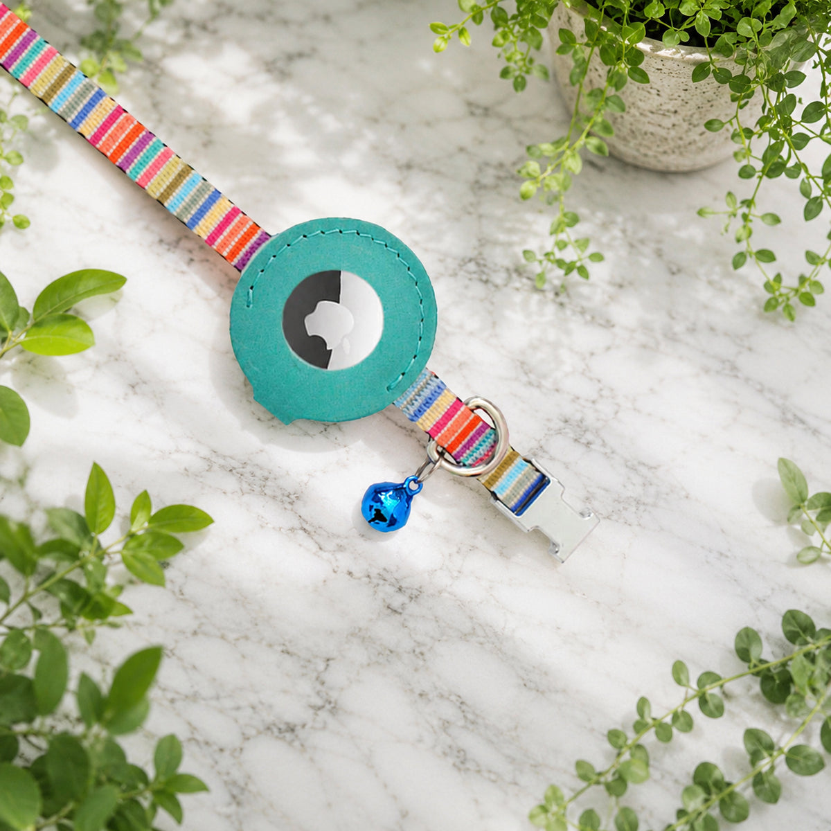 Set of artistic AirTag cat collars with integrated GPS safety and breakaway buckles