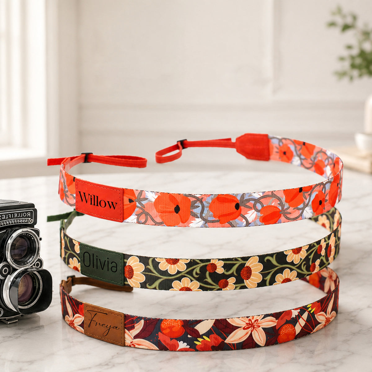 Personalized Artisan Explorer camera strap – front view on flat surface