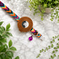 Artistic cat collar with integrated AirTag holder – side view