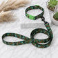 Dog collar and leash with green pattern on a marble surface