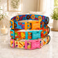 Colorful dog collars with personalized names on a marble surface.