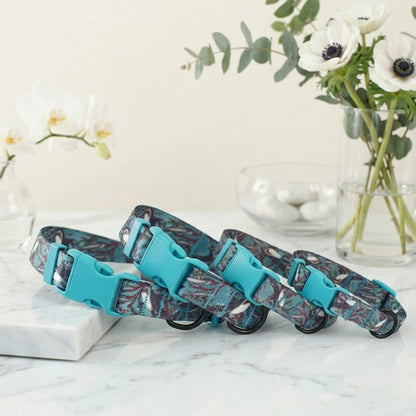 Whimsical World dog collar – multiple color variants on marble surface