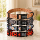 Stack of colorful dog collars with engraved names on a marble surface.