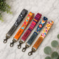 Colorful lanyards with name tags on a marble surface